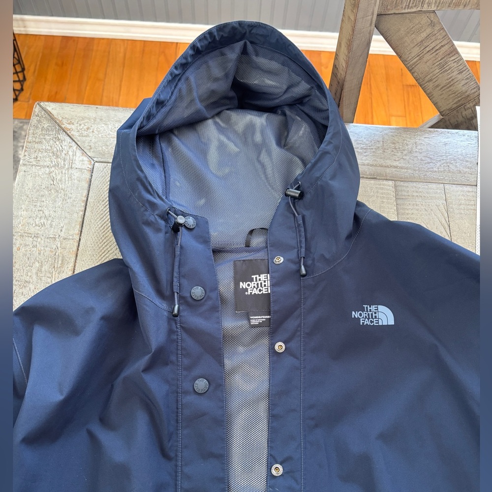The North Face women’s  Dark Blue Raincoat